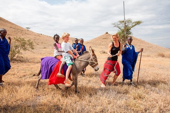 1 Day Olpopongi Real Maasai Cultural adventurous Trip | BURIGI CHATO SAFARIS LTD - A welcome with song, dance, and a Maasai boma