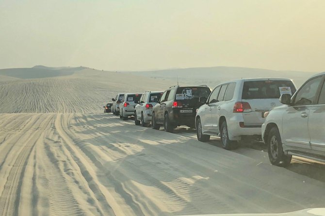 4 Hour Desert Safari, Camel Ride & Inland Sea Beach - Sandboarding and the Best Photo Stops