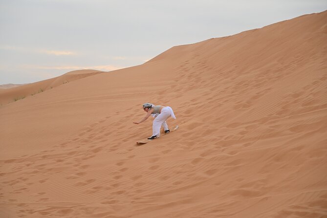 4 Hour Morning Desert Safari with Camel Ride & Sand Boarding - Dune bashing: the loud, bumpy centerpiece
