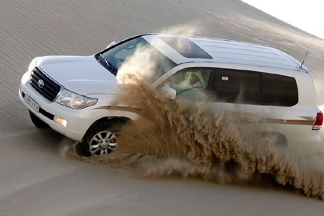 4hr Desert Safari: Sunset,Sunrise,Camel,Sand boarding,Inland Sea - The Inland Sea and the view toward Saudi Arabia