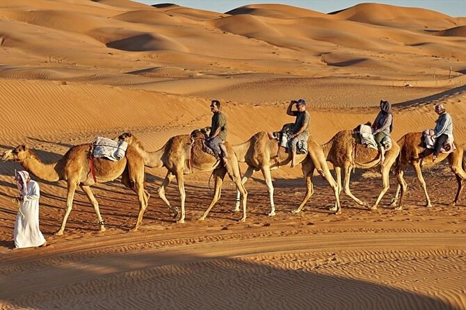 4x4 Arabian Adventure Desert Safari with BBQ Dinner - Belly dancing, Tanura, and the fire show
