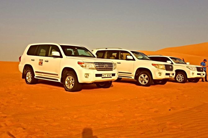 6 Hour Private Evening Desert Safari With BBQ Dinner - Sandboarding adds a simple, family-friendly challenge