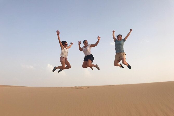 Abu Dhabi: 7-Hours Desert Safari with BBQ, Camel Ride & Sandboarding - Dune bashing across the Abu Dhabi sand