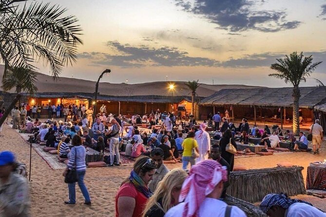 Abu Dhabi Desert Safari BBQ Dinner Live Shows Pick & Drop More - Traditional clothing and henna at the camp