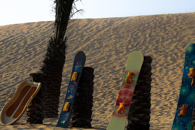 Abu Dhabi Desert Safari (Dune Bashing, BBQ Dinner, Camel Ride & Sand Skii) - The traditional camp after dark