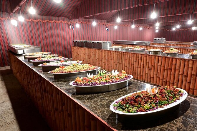 Abu Dhabi Desert Safari: Live Shows, Camel Rides & BBQ Buffet - Camel riding and a gentler view of the desert