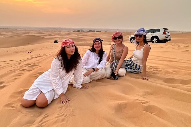 Abu Dhabi Desert Safari Tour with Shows & Buffet Dinner - Al Ajban and the 30-minute dune ride