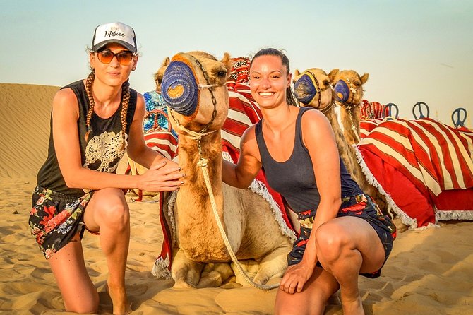 Abu Dhabi: Desert Safari with BBQ, Camel Ride & Sandboarding - Sandboarding adds a second kind of fun