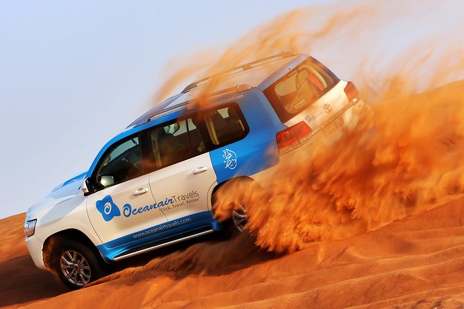 Abu Dhabi: Desert Safari with BBQ, Camel Ride & Sandboarding - Meeting camels before the sand ride