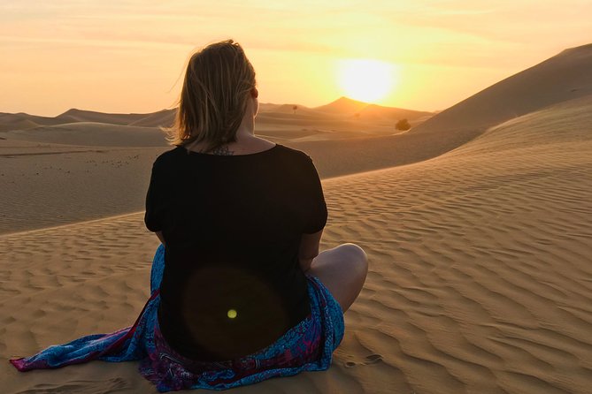 Abu Dhabi Desert safari with BBQ Dinner,Sandboarding & Camel ride - Starting in Abu Dhabi and Heading Toward the Dunes