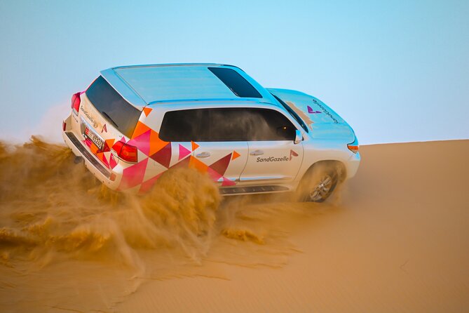 Abu Dhabi Evening Desert Safari - Dune bashing Camel ride and BBQ - From Abu Dhabi streets to open desert by 2:30 pm