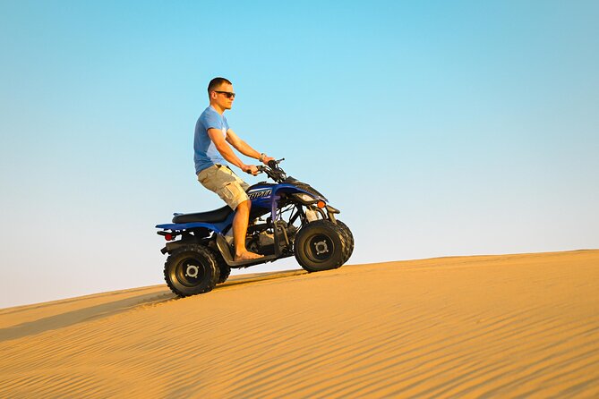Abu Dhabi Evening Desert Safari - Dune bashing Camel ride and BBQ - Dune bashing in soft sand