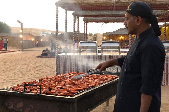 Abu Dhabi Evening Desert Safari with BBQ Dinner and all Camp Activities - BBQ dinner under the night sky