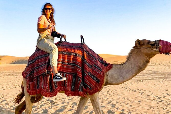 Abu Dhabi: Evening Desert Safari with Camel Ride, BBQ & Live Show - Belly dancing, Tanoura, and a dark sky