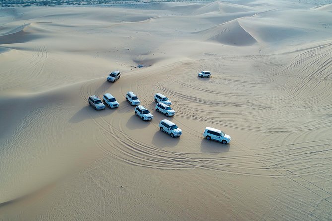 Abu Dhabi Half Day Desert Safari - Sunset, sandboarding, and the best photo stops