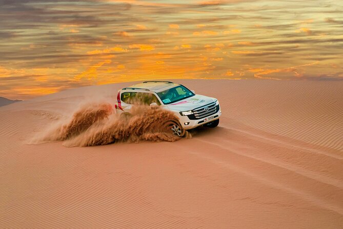 Abu Dhabi Morning Desert Safari: 4x4 Dune Bashing, Camel Ride and Sandboarding - A quick visit to the camel farm