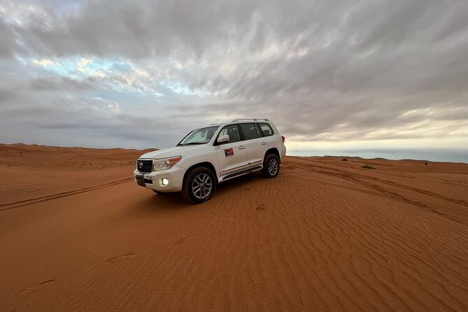 Abu Dhabi morning desert safari - Private car - Sandboarding after the main ride