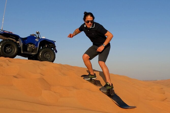 Adventure Quad Bike Safari, Camel Ride & Sandboarding - A short camel ride with Bedouin associations