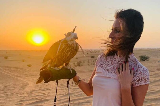 Adventurous Red Dune Desert Safari Deal with Quad Bike,Shows &BBQ - The camp dinner and eight-show program