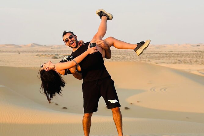 Arabian Desert Safari Abu Dhabi: 6Hour Tour with BBQ & Live Shows - Dune bashing in a 4x4 Land Cruiser