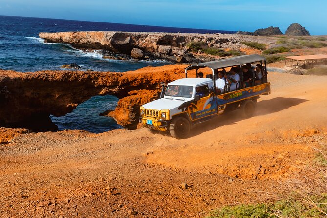 Aruba Cave Pool and Secret Beach Safari Tour - Wariruri Natural Bridge and the island’s rocky coast