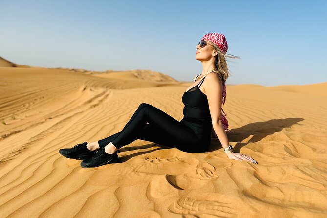 Best Dubai Desert Safari with Buffet Dinner,Sand Boarding & Shows - Camel riding and camp traditions