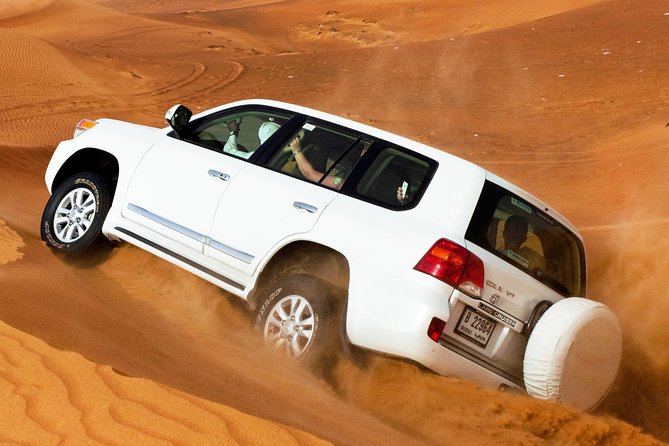 Combo Dubai City Tour and 4X4 Desert Safari with Dinner - Palm Jumeirah, Atlantis, and the tower-lined drive