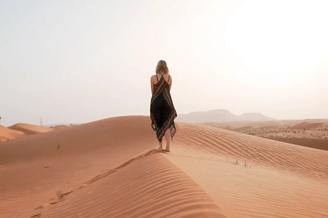 Desert Safari - Camel riding and sandboarding at the camp
