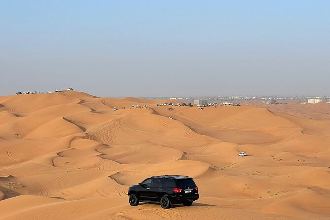 Desert safari adventure with BBQ dinner - Belly dancing, Tanoura, and the fire show