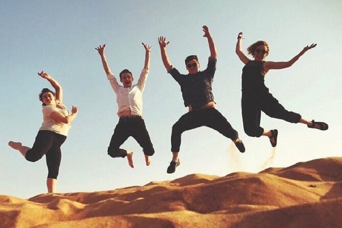 Desert Safari and Quad Bike Experience in Dubai with Dinner - Sandboarding and a short camel ride