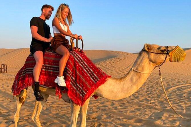 Desert Safari Dubai Tour with Dune Bashing, Camel Ride, & BBQ - Open-desert quad biking with three ride lengths