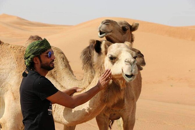 Desert Safari Dubai (VIP Package ) - Sandboarding on the soft sand