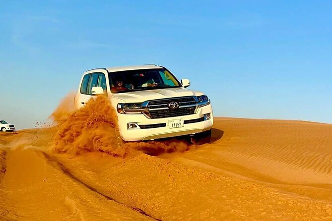 Desert Safari Dubai with BBQ Dinner & Camel Ride - Sandboarding gives you a second way to use the dunes
