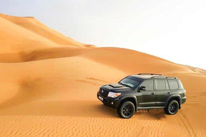 Desert Safari Dubai with BBQ - dinner, Sandboarding - Red dunes and a short burst of dune bashing