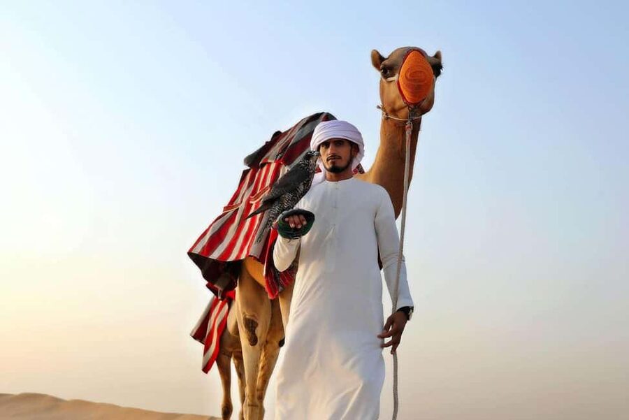 Desert Safari Dubai with Camel Ride, Sandboarding & Dinner - Quad biking across the Lahbab dunes