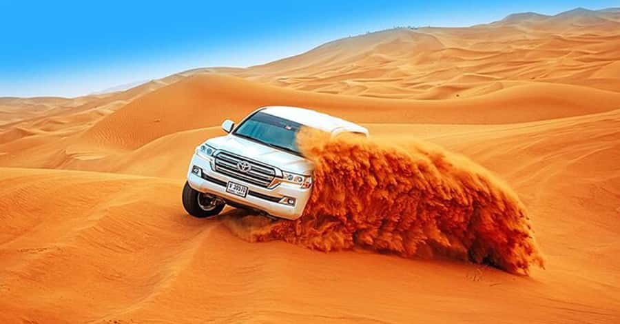 Desert Safari - Private 4WD car - Sandboarding and the sunset photo stop