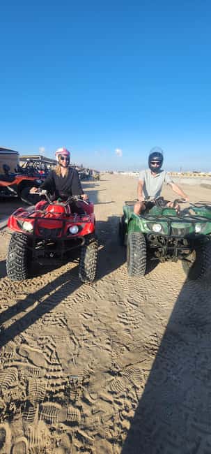 Desert Safari, QuadBike,Dune buggy, Sandboarding & CamelRide - The camel ride: a short cultural stop