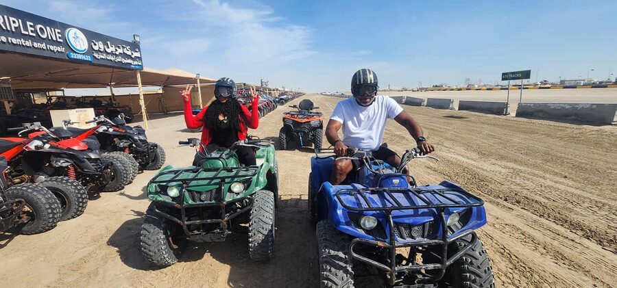 Desert Safari, QuadBike,Dune buggy, Sandboarding & CamelRide - Sandboarding on the dunes