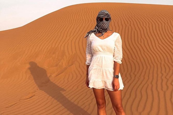 Desert Safari Red Dunes with Camel Ride, Sandboard, BBQ and Shows - Optional ATVs and the real cost of adding extras