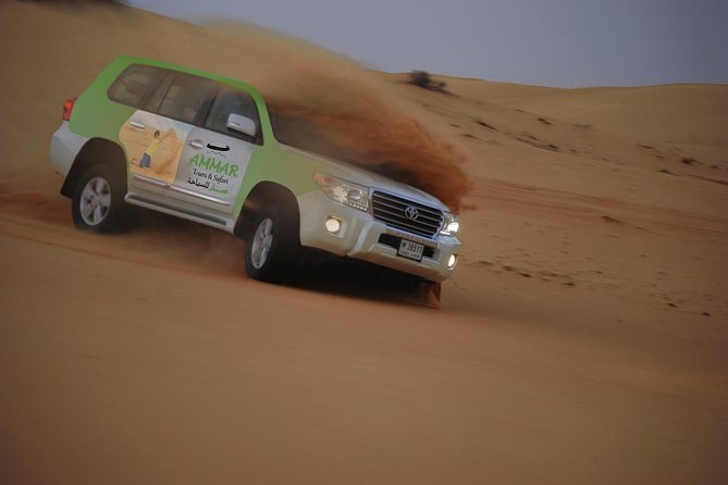 Desert Safari Tour, Quad Bike with BBQ Dinner & Show from Dubai - Dune bashing across the golden dunes