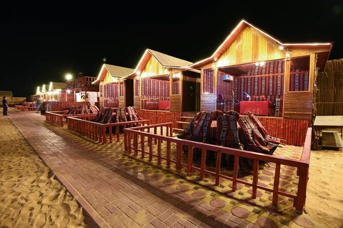 Desert Safari With BBQ Dinner, Quad Bike & Camel Ride from Dubai - Camel riding, sandboarding, falcons, and Arabic hospitality