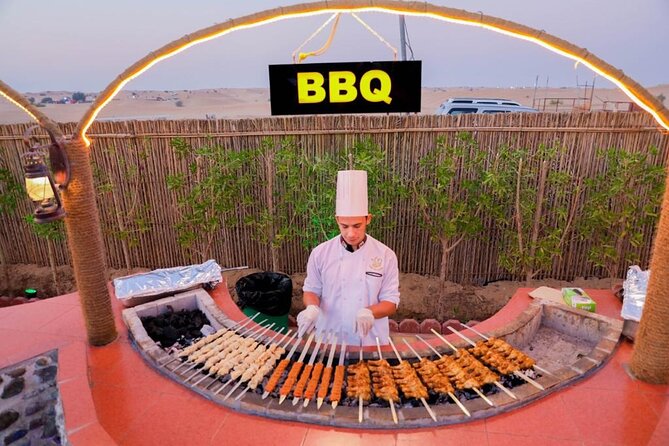 Desert Safari With BBQ Dinner, Quad Bike & Camel Ride from Dubai - Dinner on carpets and cushions