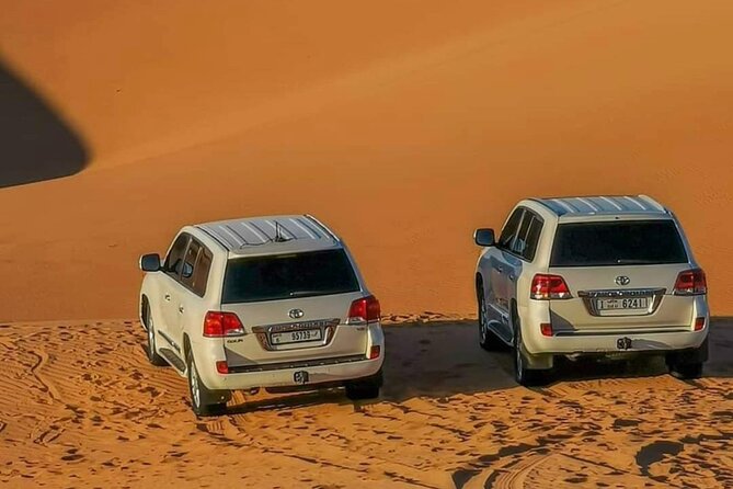 Desert Safari With BBQ Dinner, Quad Bike & Camel Ride from Dubai - Dune bashing across the Lahbab dunes