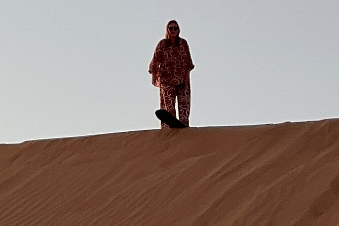 Desert Safari with Dune Bashing and Camel Ride plus Sand Boarding - Sunset Photos in the Open Sand