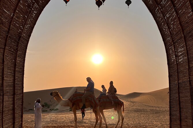 Desert Safari with Dune Bashing and Camel Ride plus Sand Boarding - Henna, Falcon Photos, and Traditional Dress