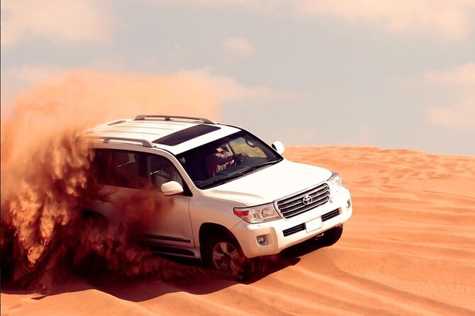 Desert Safari with Quad Bike, 4x4 Dune Bashing and Camel Ride - Dune bashing in a licensed 4x4