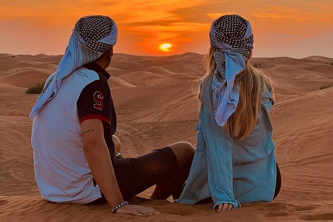 Desert Safari with Quad Bike Camel ride ,SandBoarding ,InalndSea - The dune drive is the main event