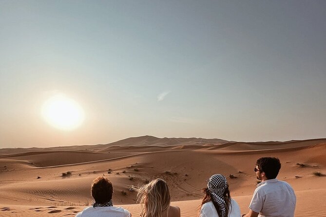 Desert Safari with Quad Bike Camel ride ,SandBoarding ,InalndSea - Your first stop: tea, camels, and a useful pause