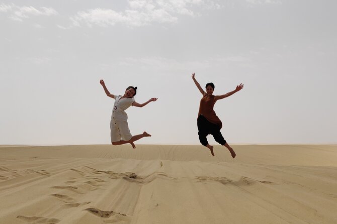 Desert Safari with Sandboarding and Inland Sea Private Tour - Guides, driving, and the human side of the trip