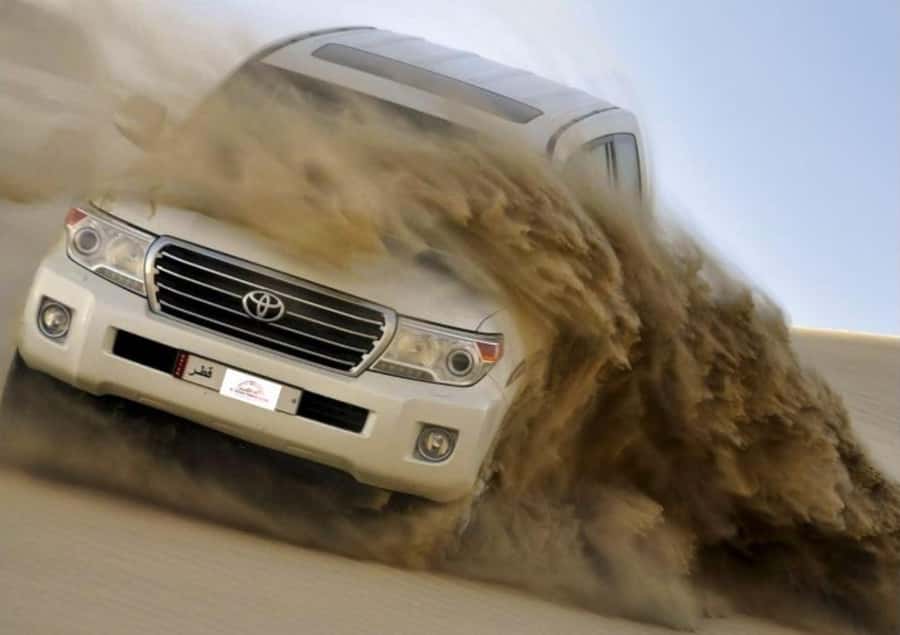 Doha: Budget Friendly Desert Safari,CamelRide & Sandboarding - Sandboarding for beginners and casual adventurers